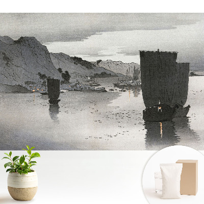 Vele și munți la amurg