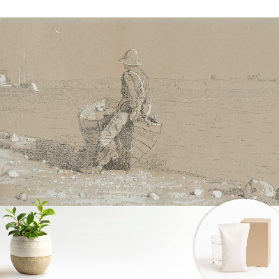 Bărbat cu o barcă pe plajă