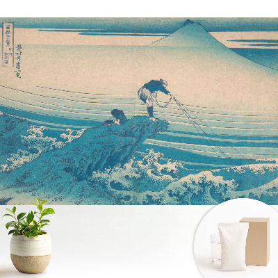 Pescari cu un munte în fundal.