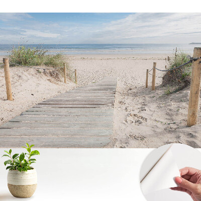 Intrarea pe plajă printre dune