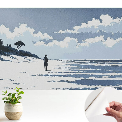 Siluetă singură pe fundal albastru de plajă