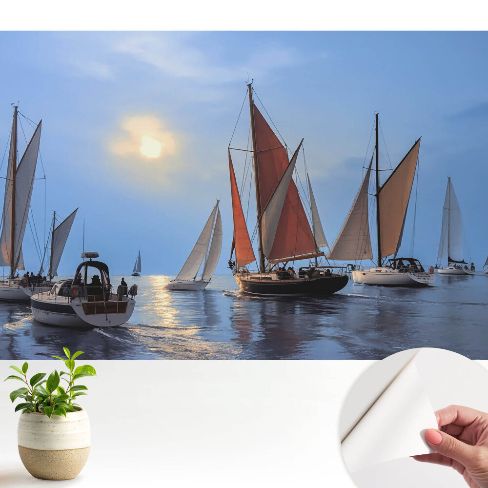 Iahturi și apus de soare pe o mare calmă