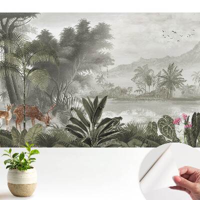 Peisaj forestier exotic cu cerbi