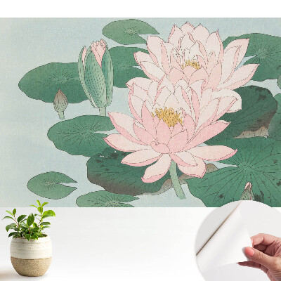 Flori de lotus pe frunze verzi