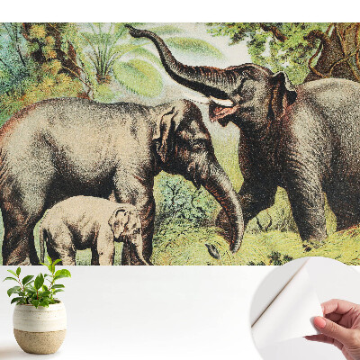 Familie de elefanți pe fundalul junglei