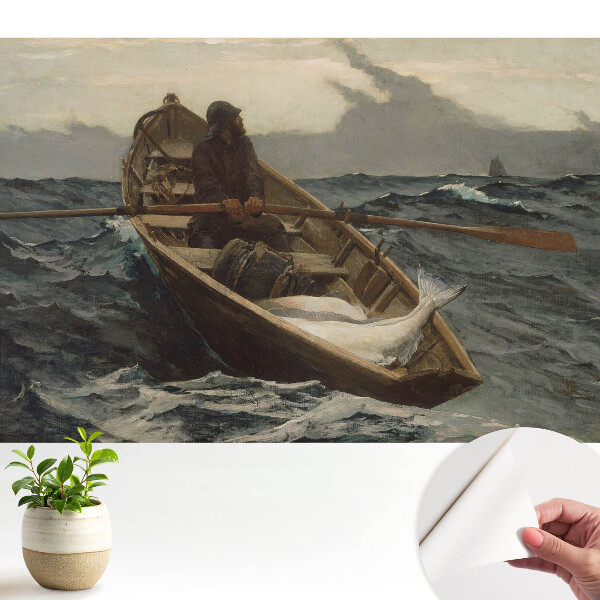 Un pescar pescuiește într-o mare furtunoasă