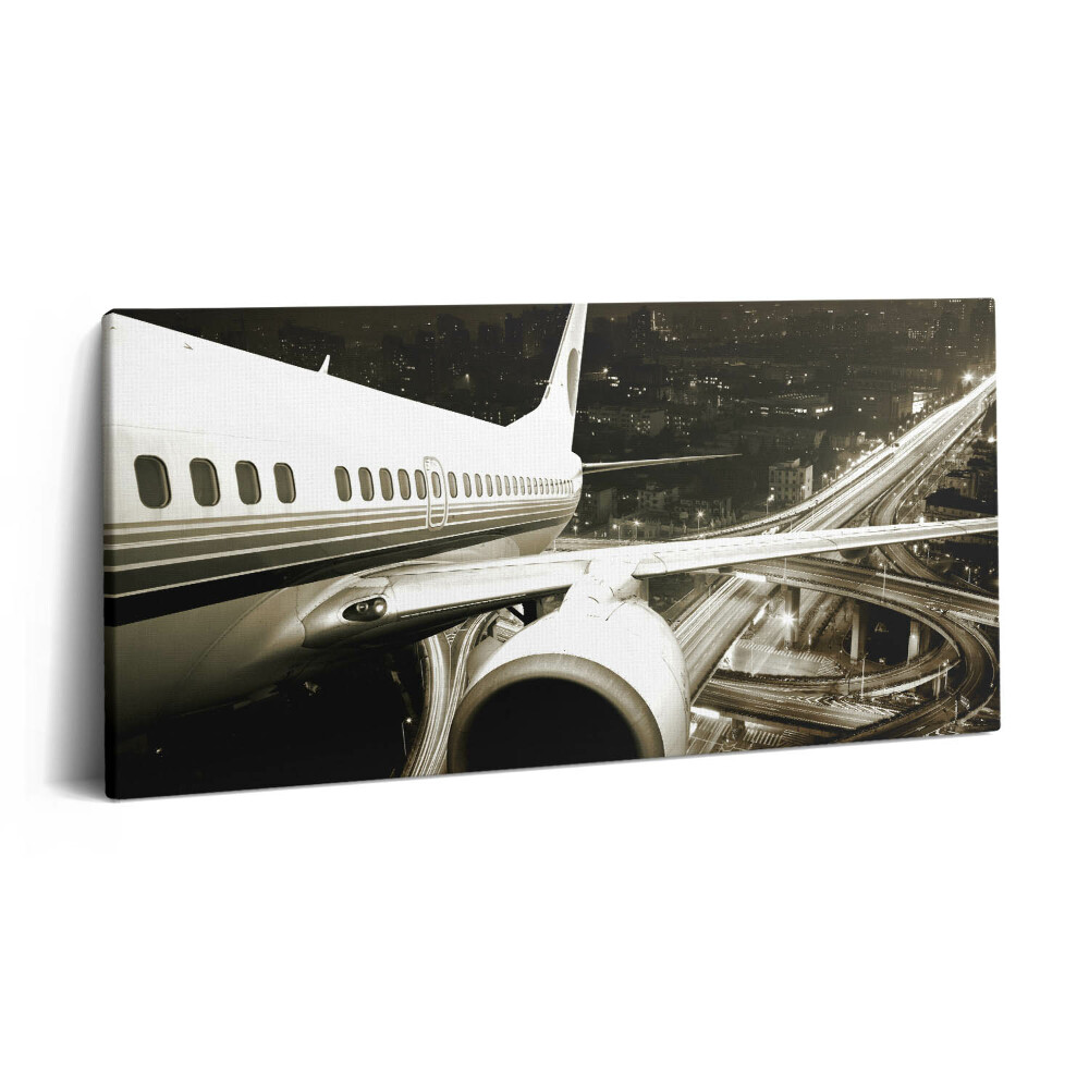 Imprimare tablou canvas 120x60 Avionul și orașul
