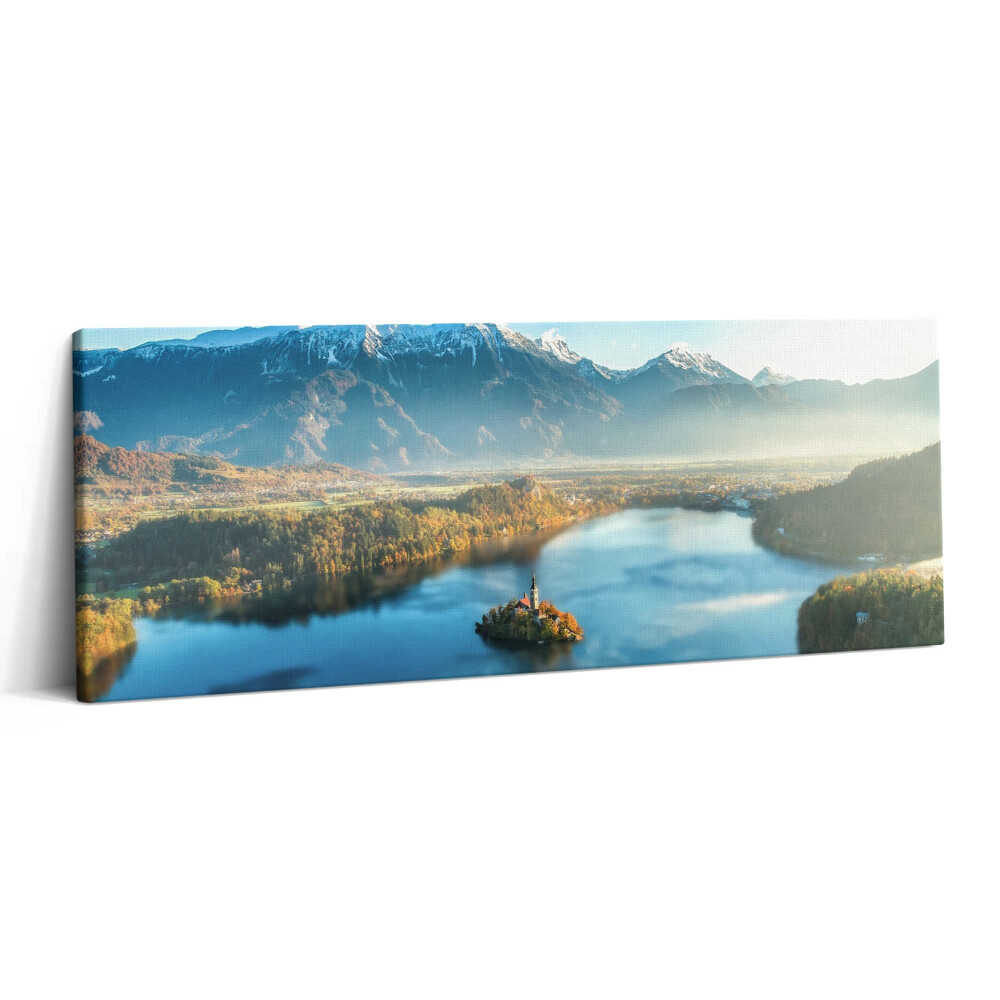 Print pe canvas 125x50 O clădire pe un lac în munți