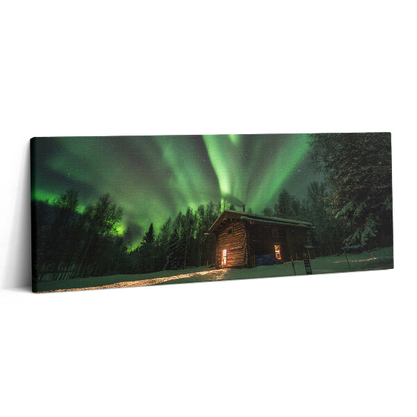 Print pe canvas 125x50 Aurora boreală și o casă în pădure