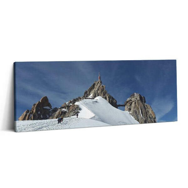 Print pe canvas 125x50 Vârful muntelui iarna