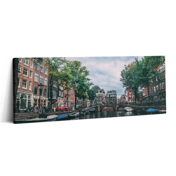 Print pe canvas 125x50 Un canal în centrul Amsterdamului