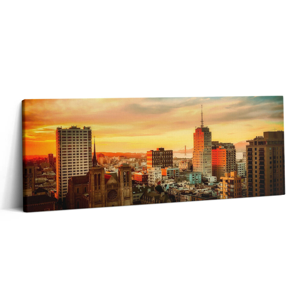 Print pe canvas 125x50 Panoramă a orașului la răsăritul soarelui
