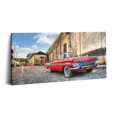Print pe pânză 140x70 Mașină roșie veche în cartierul columbian