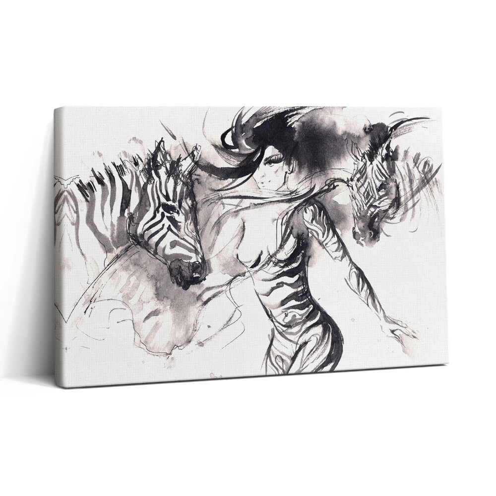 Tablou canvas 30x20 Femeie printre zebre abstracte