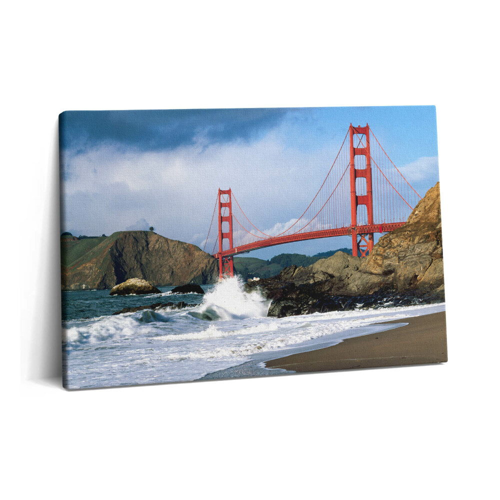 Tablou pe pânză 60x40 Valuri pe malul mării și podul roșu