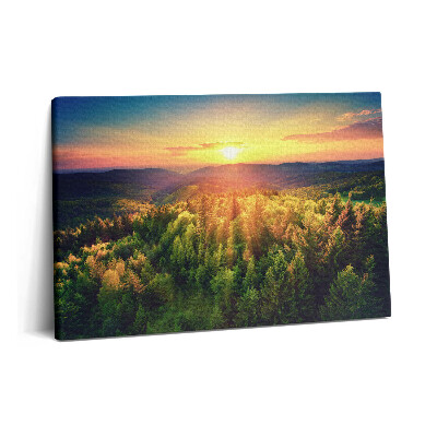 Tablou pe pânză 60x40 Apus de soare peste dealurile pădurii