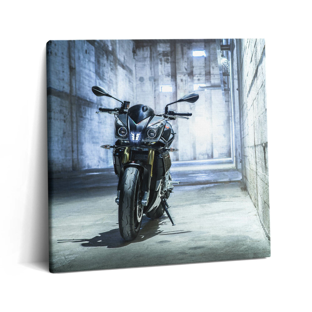 Tablou pe pânză canvas 60x60 O motocicletă pe o bandă betonată a orașului