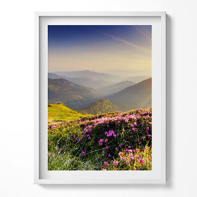 Tablou living cu rama Munți și o pajiște cu flori