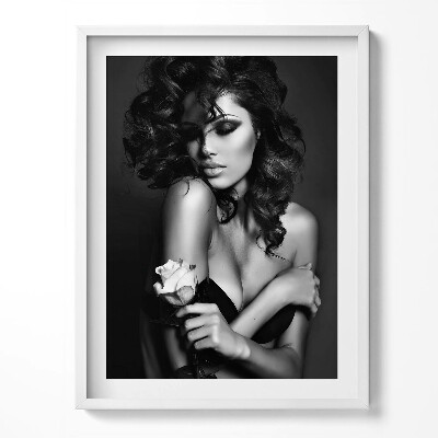 Tablou rama Portretul unei femei frumoase cu o floare