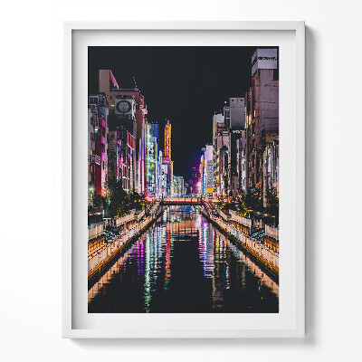 Tablou living cu rama Oraș nocturn cu lumini reflectate în apă