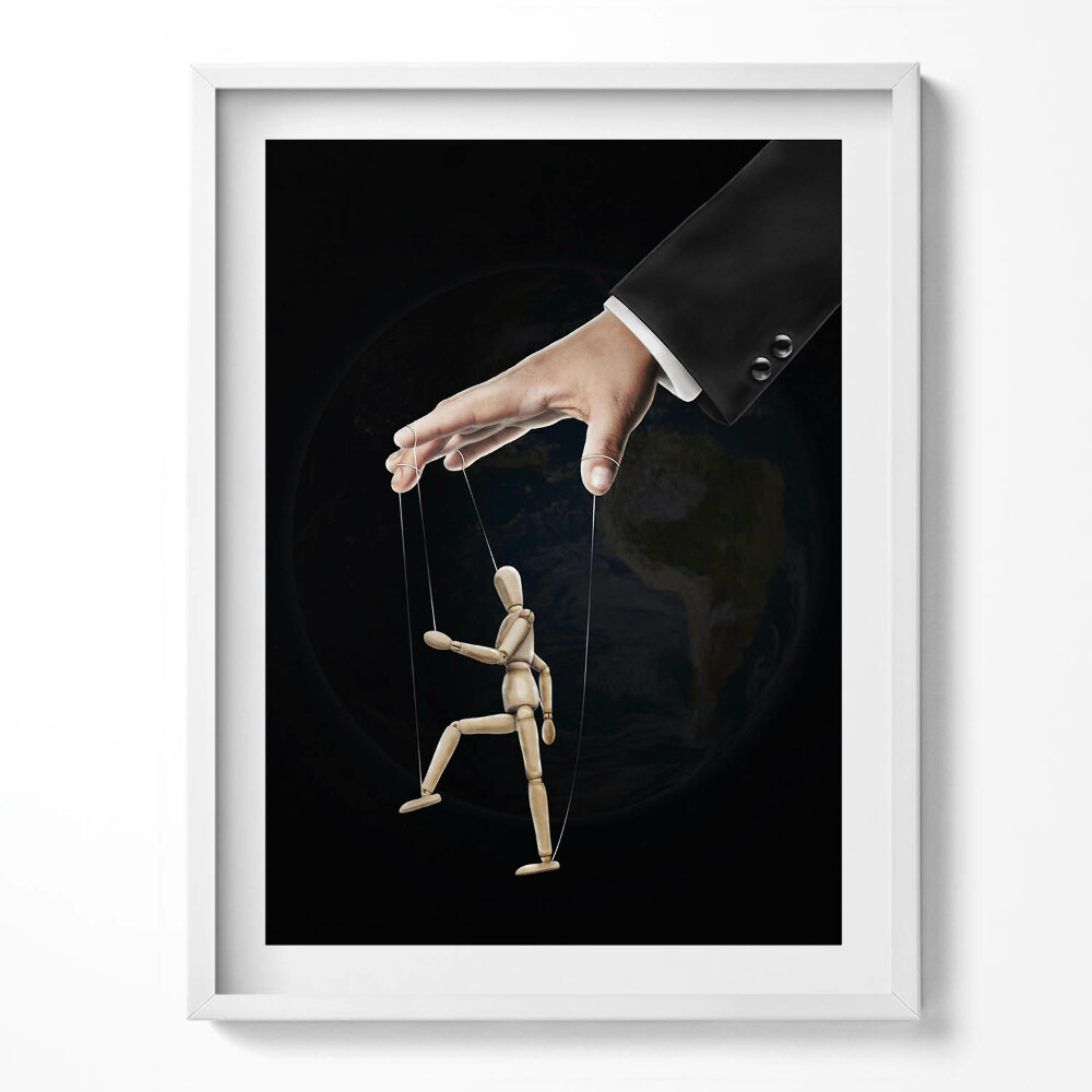Tablou living cu rama Mâna care controlează marioneta