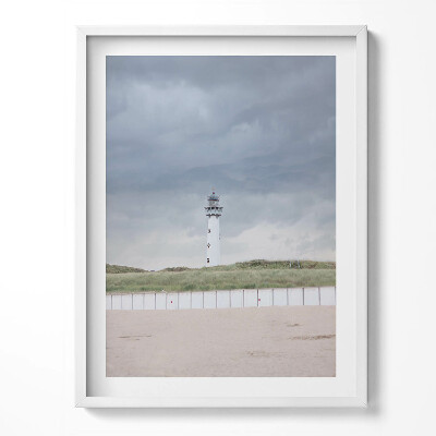 Tablou rama Un far singuratic pe plajă