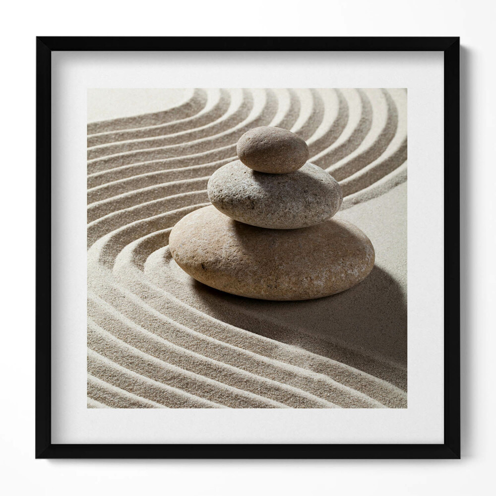 Tablou rama unic O grămadă de pietre pe nisip zen