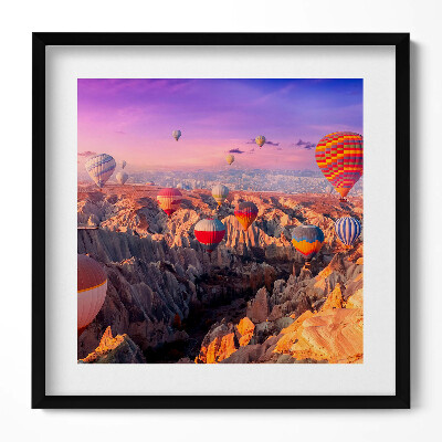 Tablou living cu rama unic Baloane care zboară peste canion