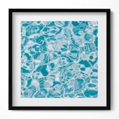 Tablou living cu rama unic O pânză de apă albastră și transparentă