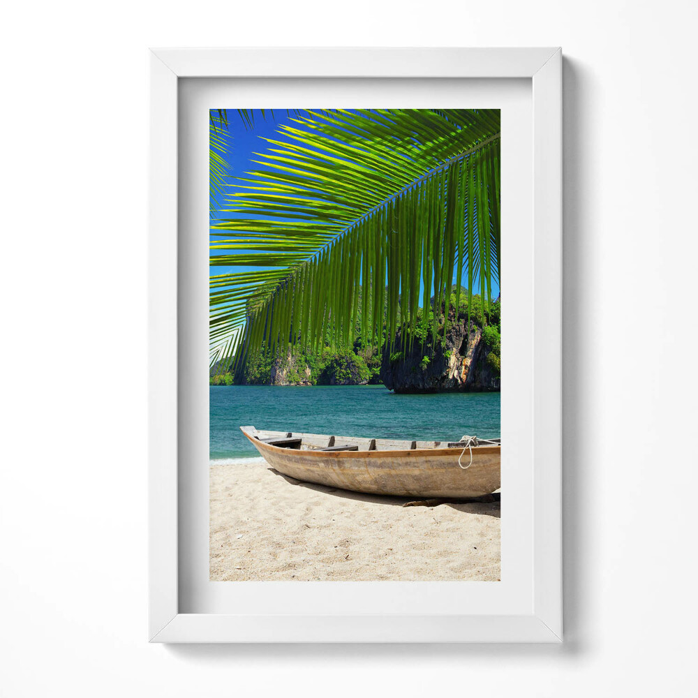 Tablou living cu rama decorativ O barcă pe plajă sub un palmier