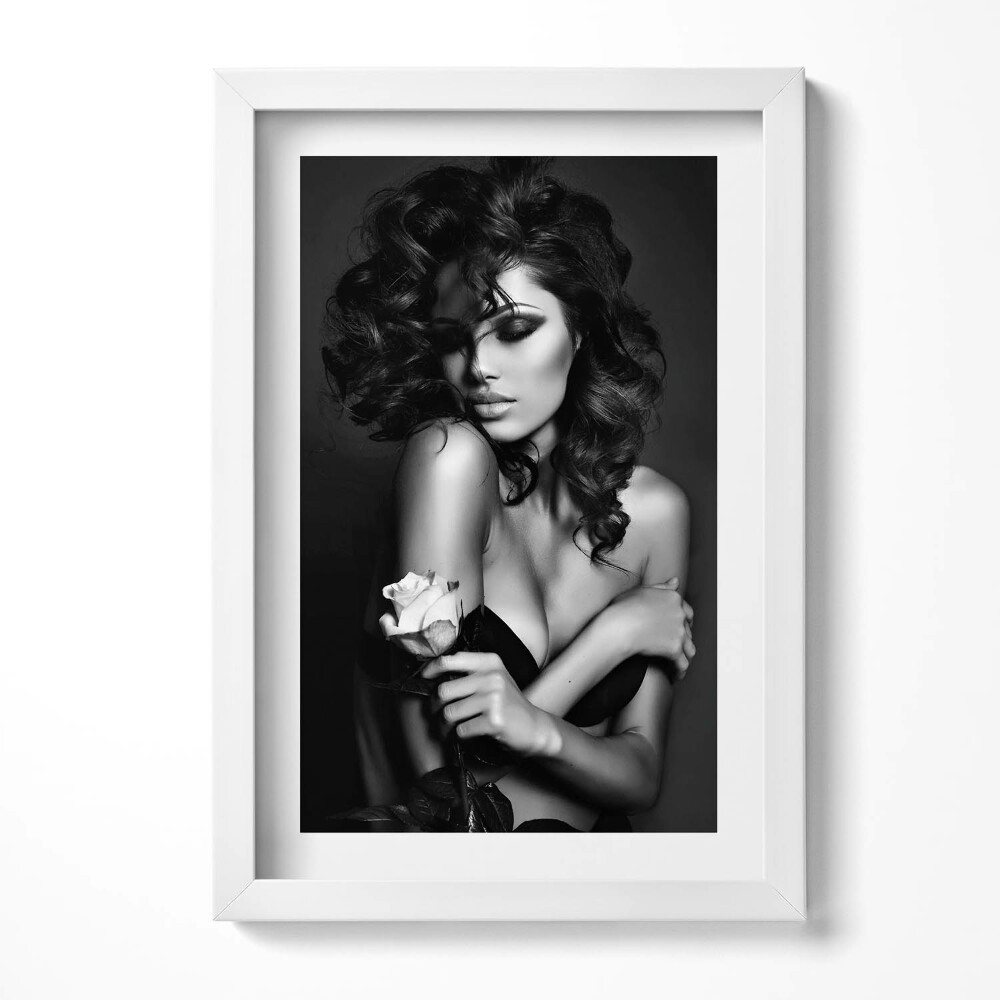 Tablou rama decorativ Portretul unei femei frumoase cu o floare