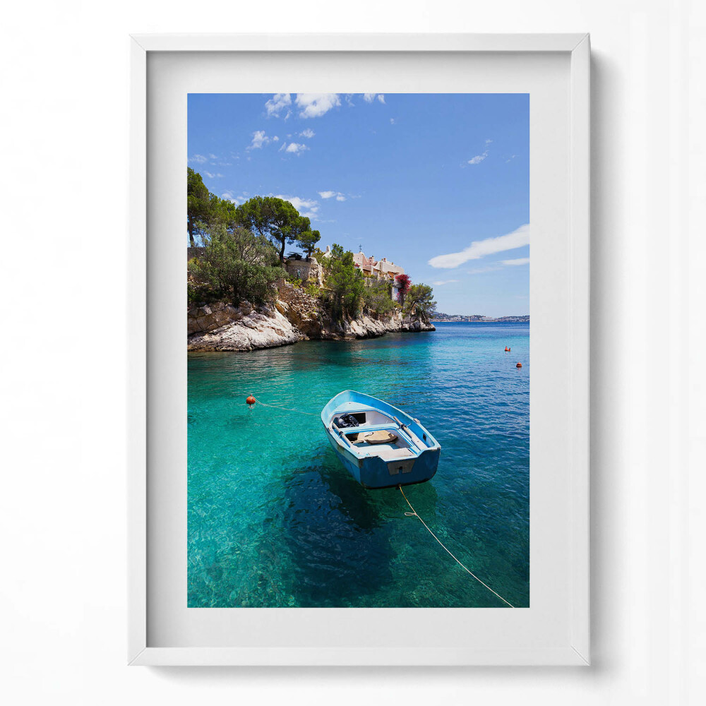 Tablou living cu rama modern O barcă pe o mare turcoaz