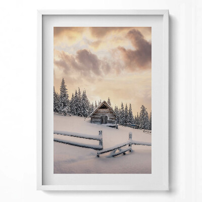 Tablou rama modern Peisaj al unei cabane montane iarna și la apus