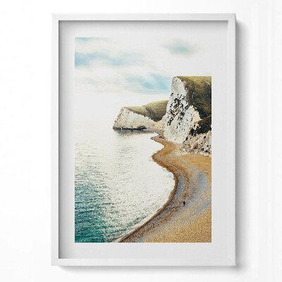 Tablou living cu rama modern O plajă liniștită la poalele stâncilor