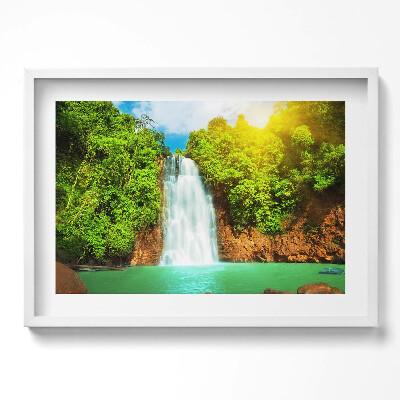 Tablou living cu rama excepţional Peisaj cu o cascadă printre verdeață