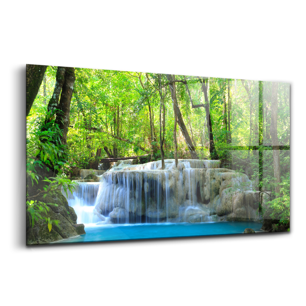 Tablou sticlă Peisaj cu cascadă în iaz de pădure