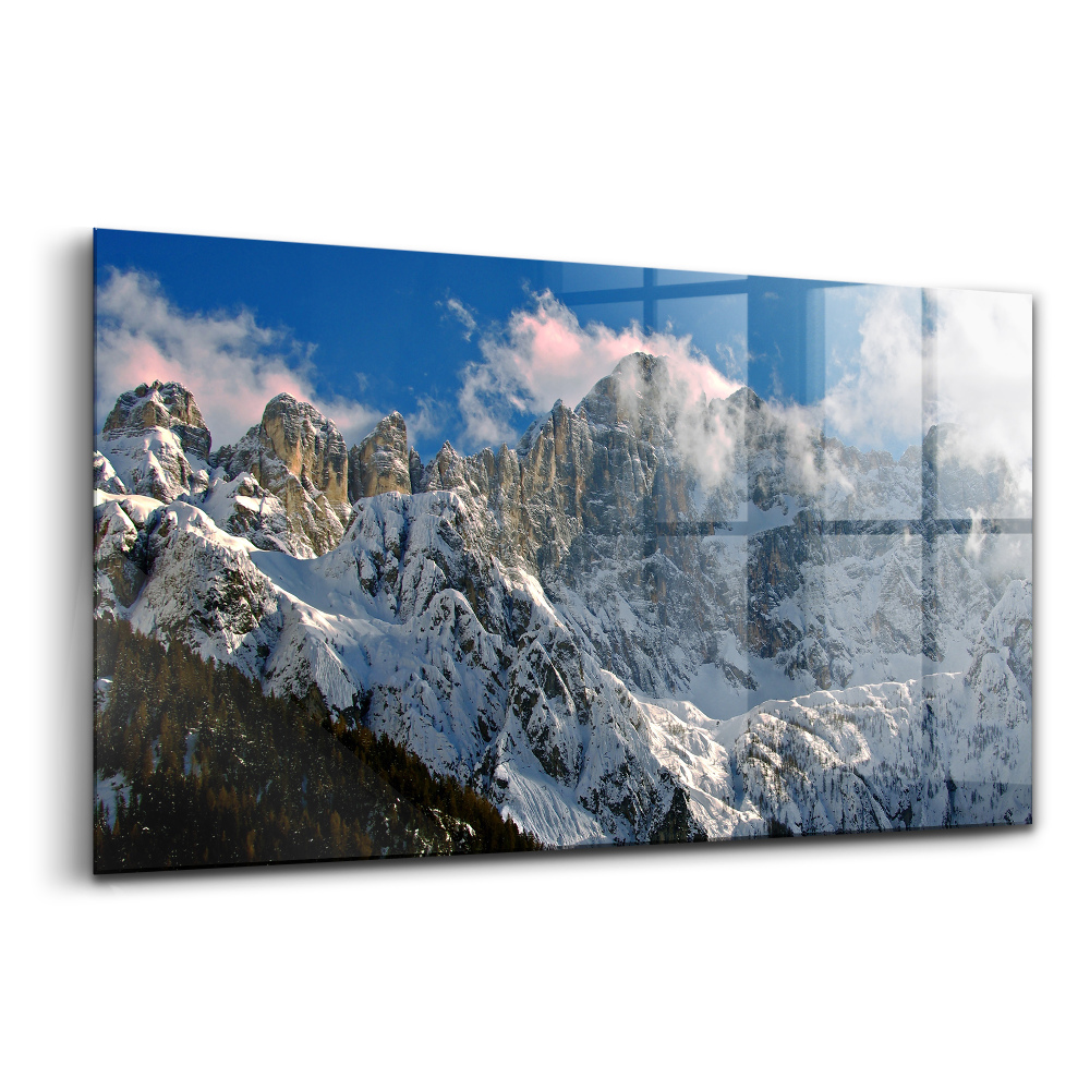 Tablou de sticlă Munți sub cer albastru